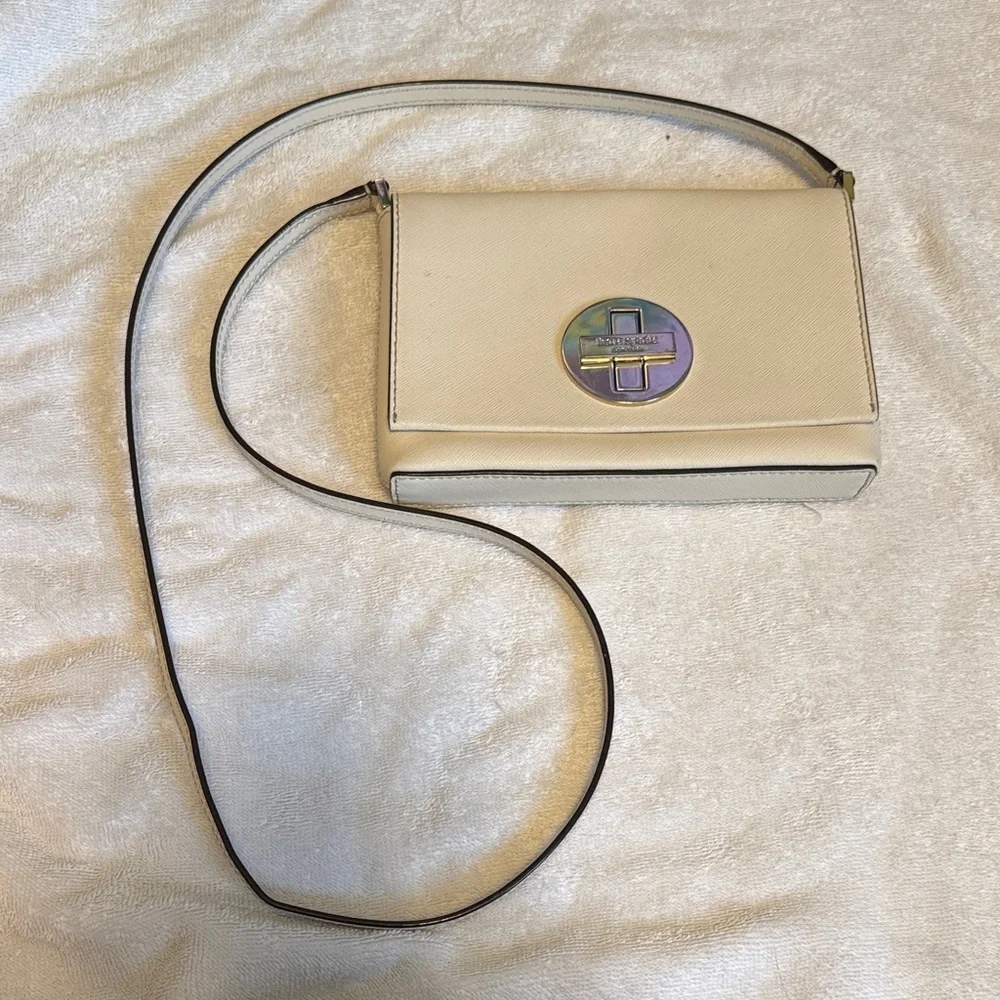 kate spade cream crossbody with gold turn-lock